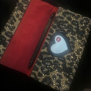 Elegant Black and Gold leopard clutch